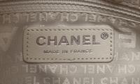A Chanel Coral Calfskin Leather Quilted Fold Over Handbag, 12.5" x 11" x 4.5".
