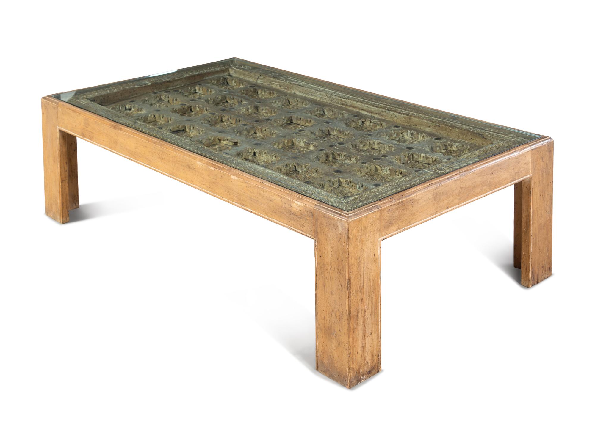 An Indian Iron Mounted Wood Door Converted to a Low Table