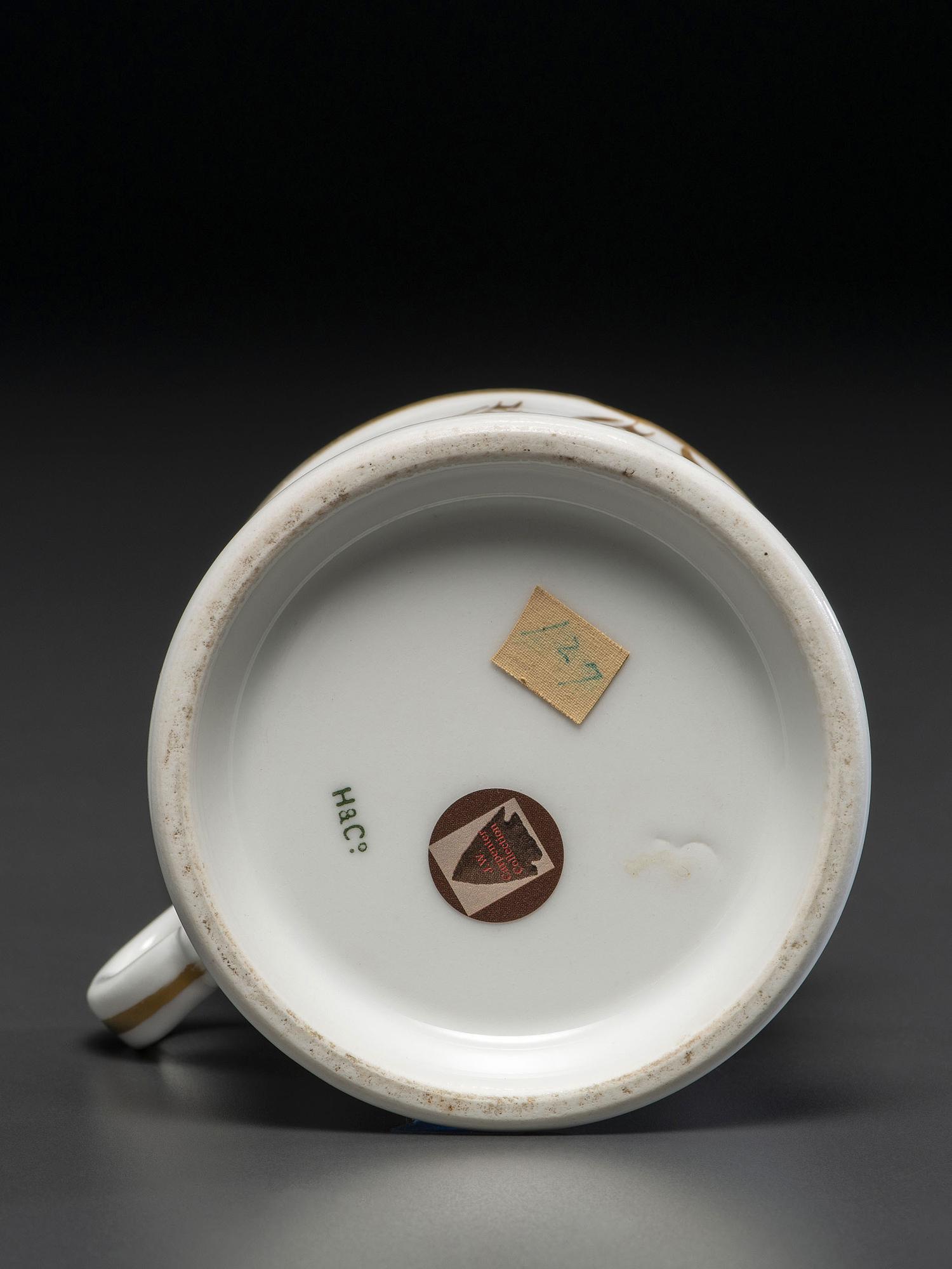 A Furniture Dealer's Porcelain Occupational Shaving Mug