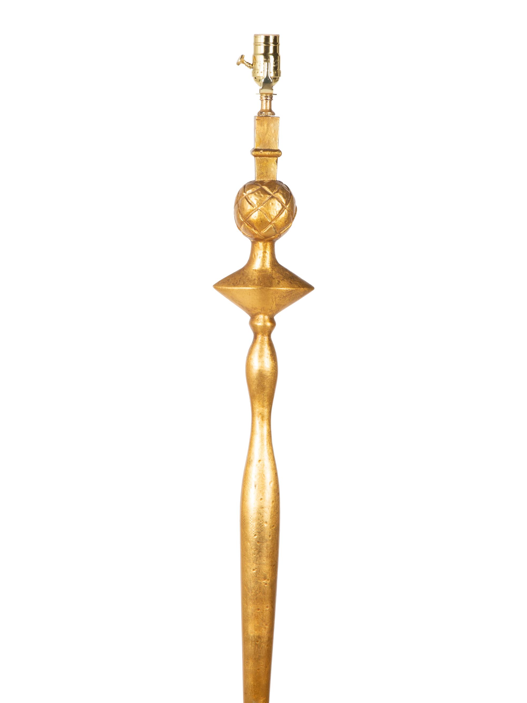 A Gilt Lead Floor Lamp — CIRCA 1930