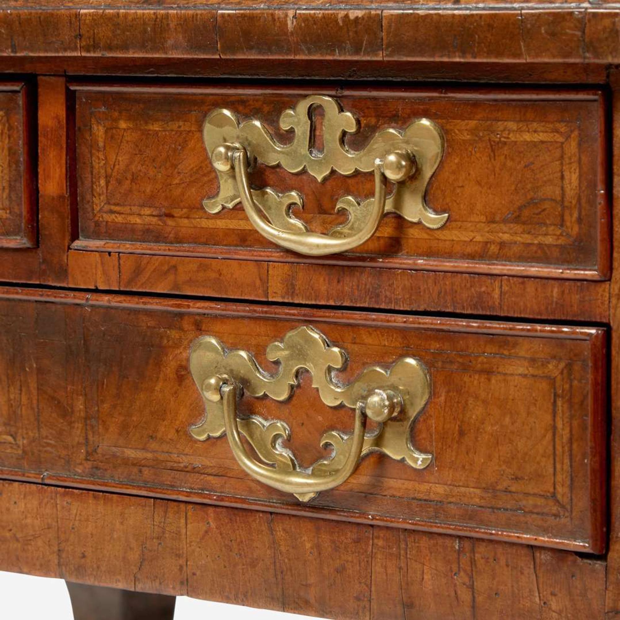 A Queen Anne inlaid and veneered walnut dressing table circa 1730