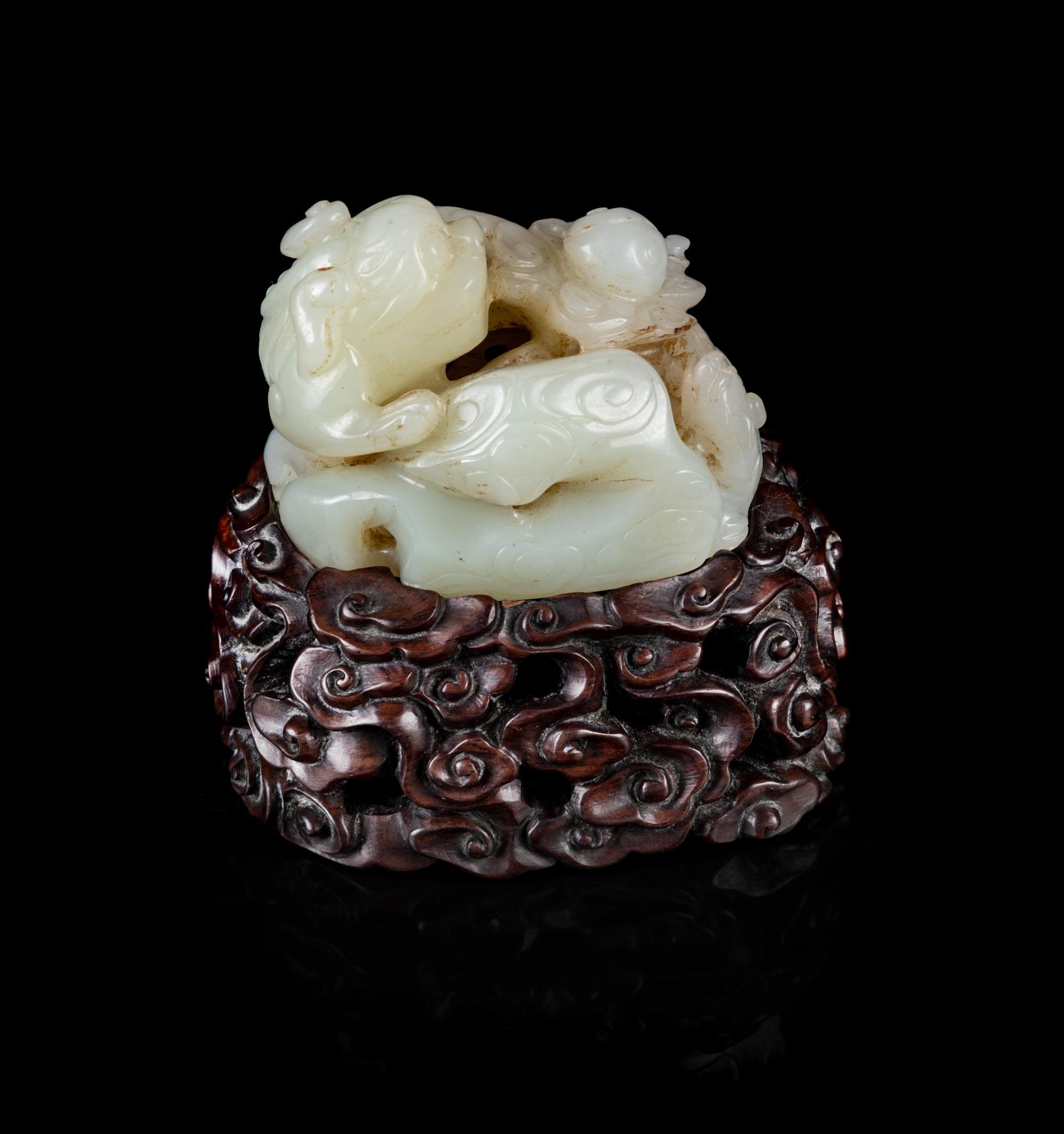 A Chinese Celadon Jade Figural Group of Tianlu