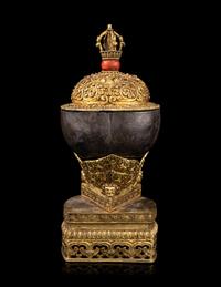 A Tibetan Coral Inset Silver and Gilt Bronze Kapala Bowl