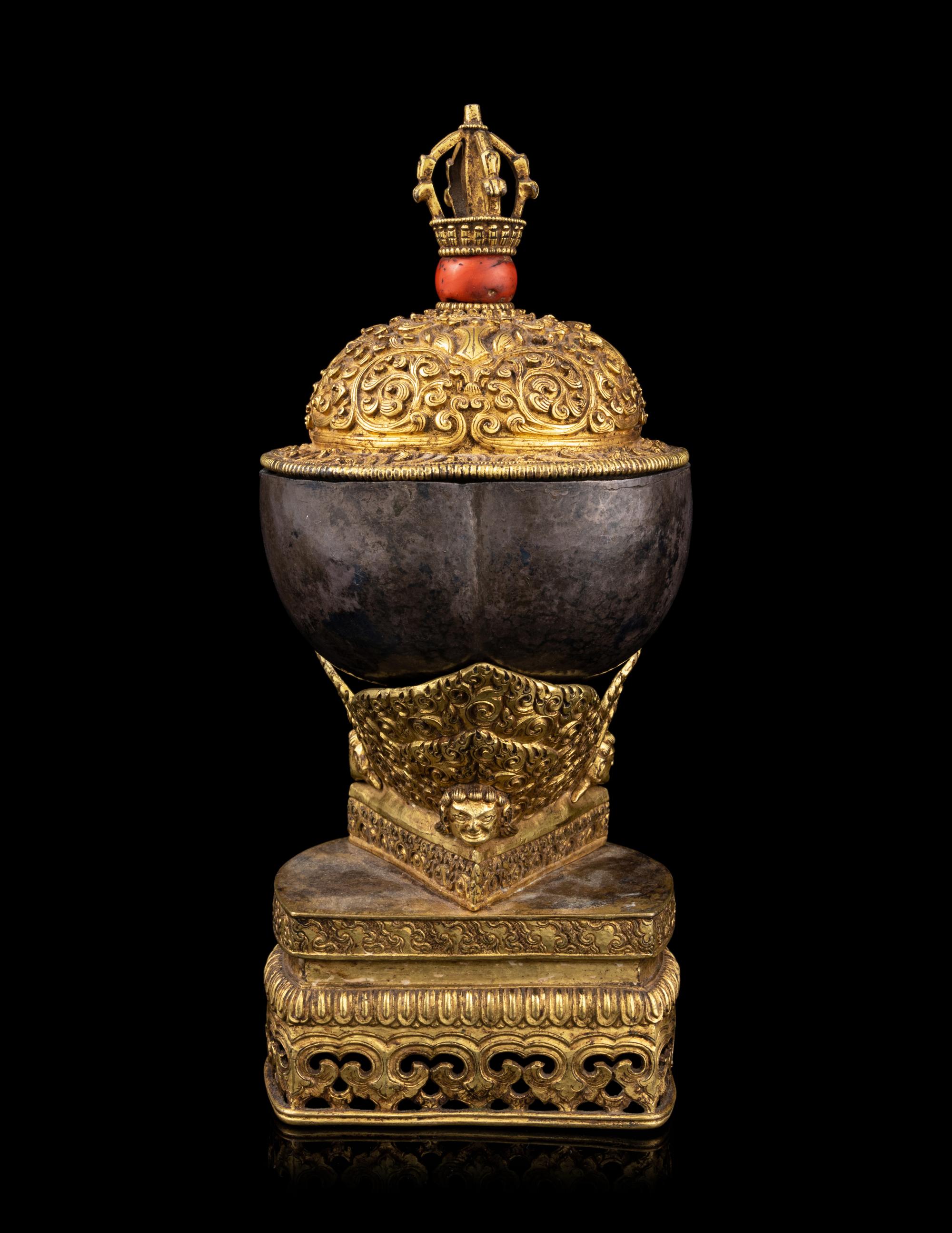 A Tibetan Coral Inset Silver and Gilt Bronze Kapala Bowl