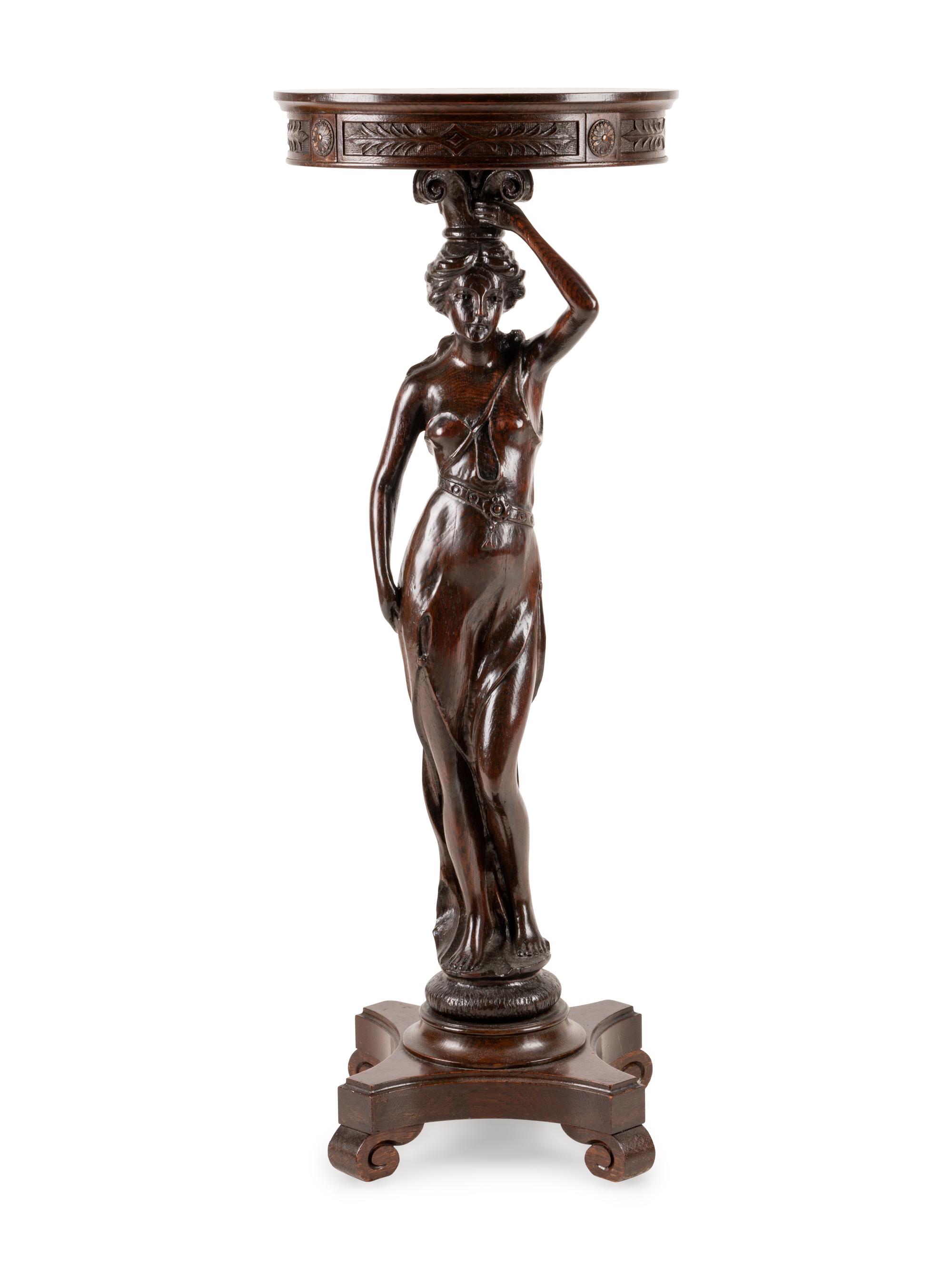 A Victorian Carved Oak Figural Pedestal