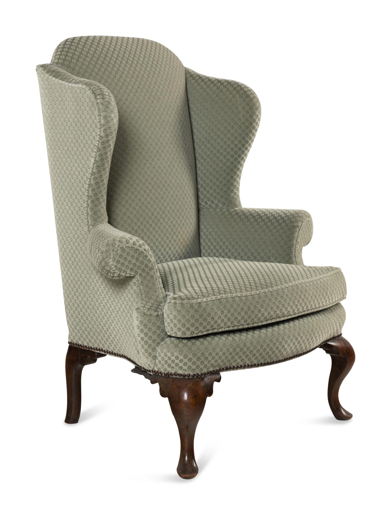 A Queen Anne Style Mahogany Wing-Back Armchair