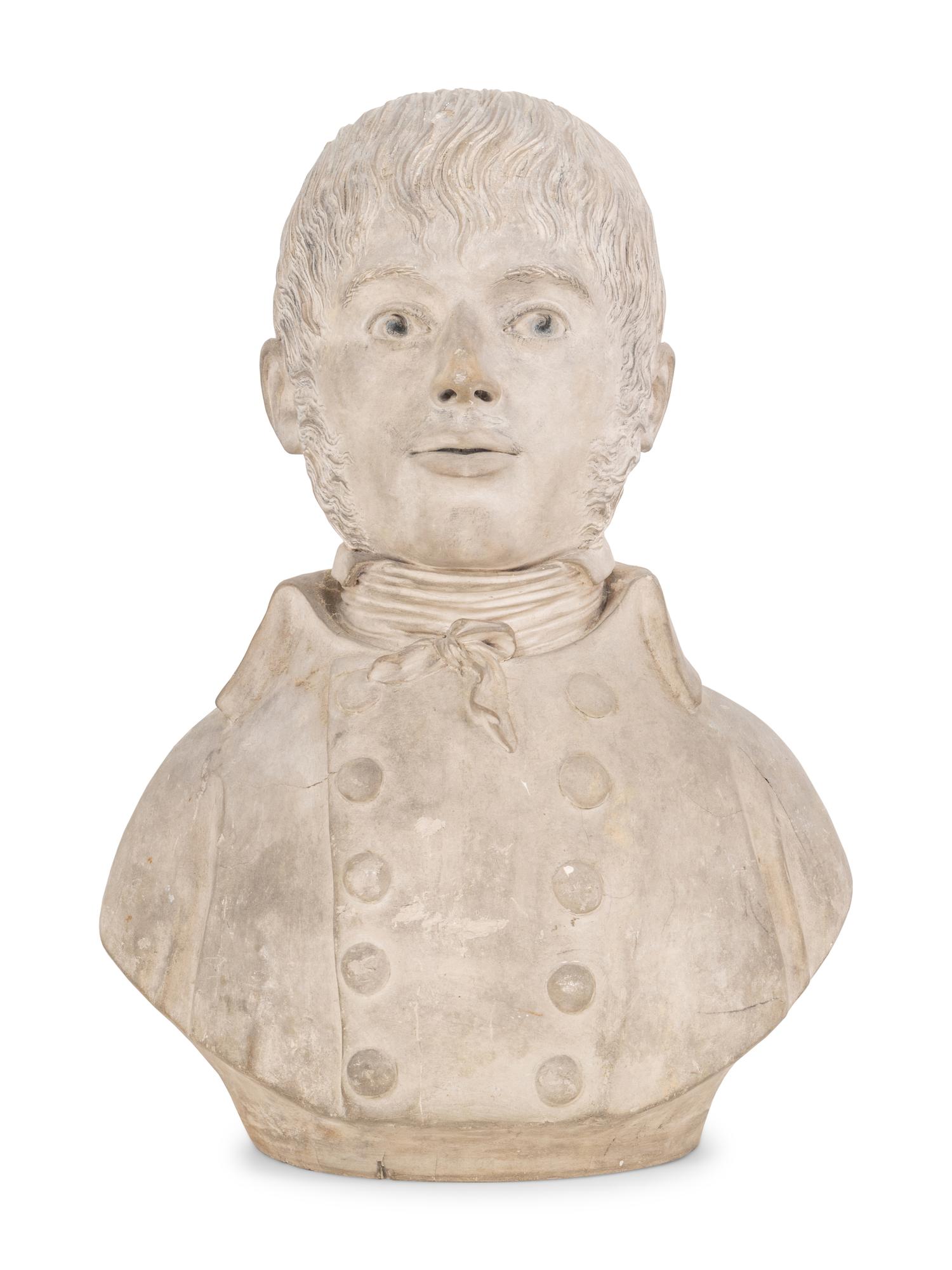 A Gray Plaster Bust of a Young Man