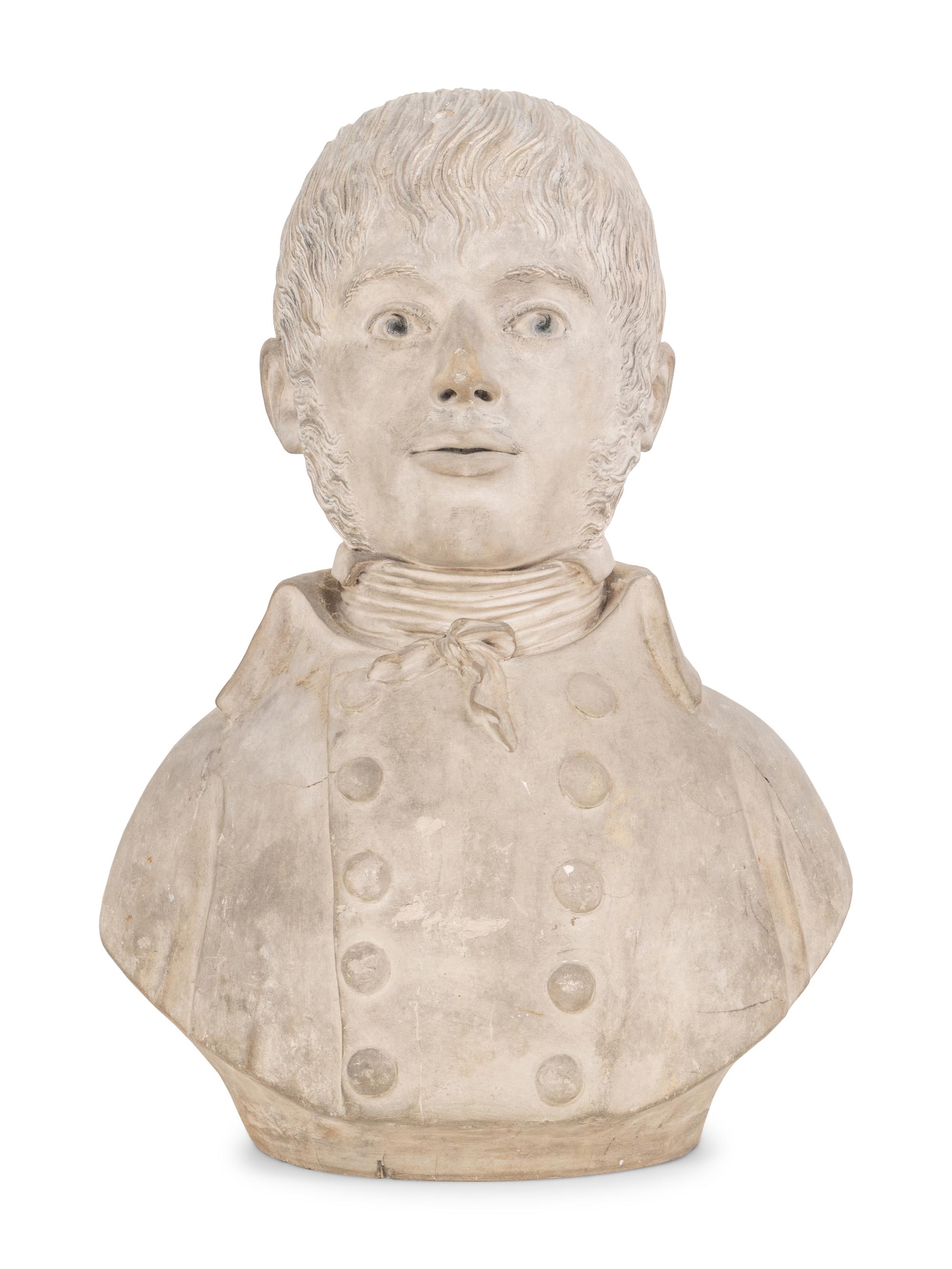 A Gray Plaster Bust of a Young Man