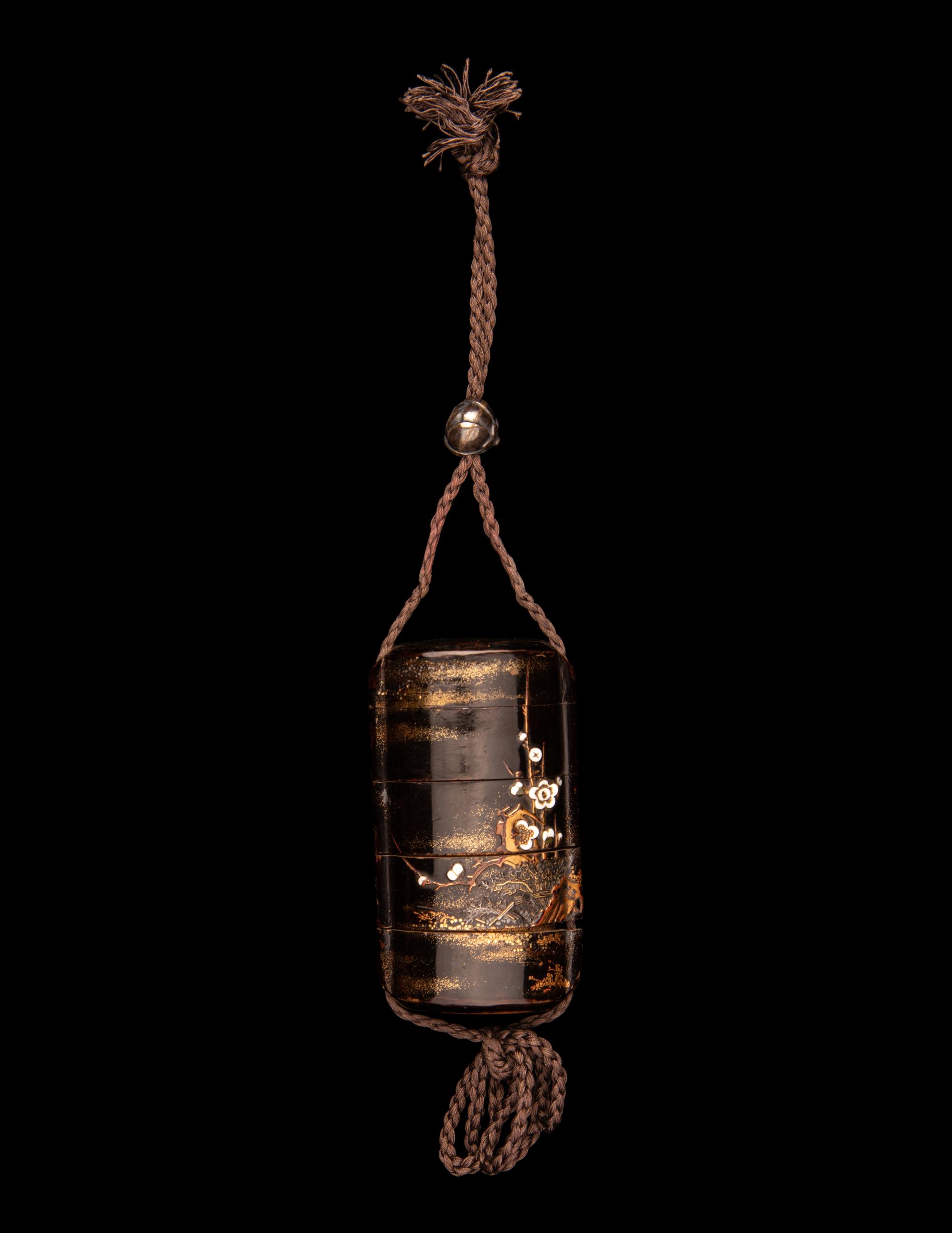 A Japanese Embellished Gold and Black Lacquer Four-Case Inro