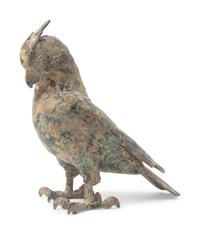 A Patinated Metal Zoomorphic Figure