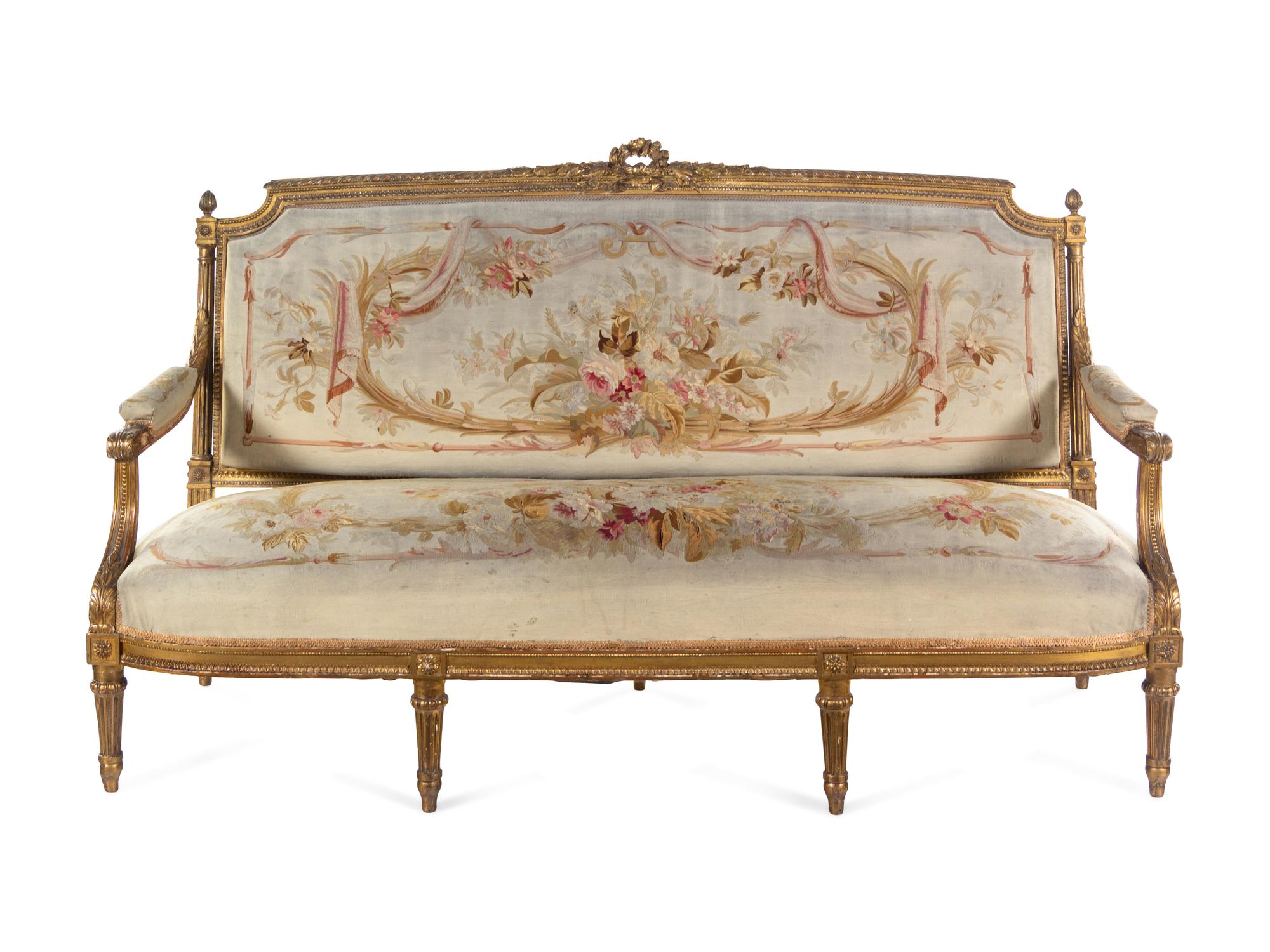 A Louis XVI Style Carved Giltwood Five-Piece Parlor Suite