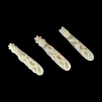 Three Greyish White Jade 'Dragon' Belt hooks, Qing Dynasty 清 灰白玉龍鈎三枚