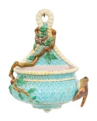 An English Majolica Jardiniere with Stand and a Cistern-form Wall Pocket