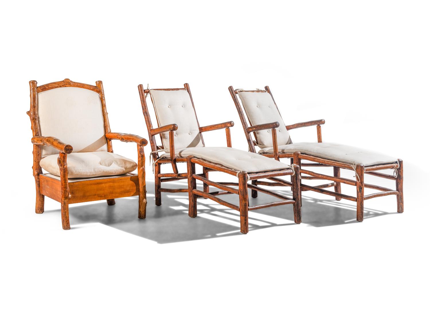 A Group of Three Rustic Wood Chairs