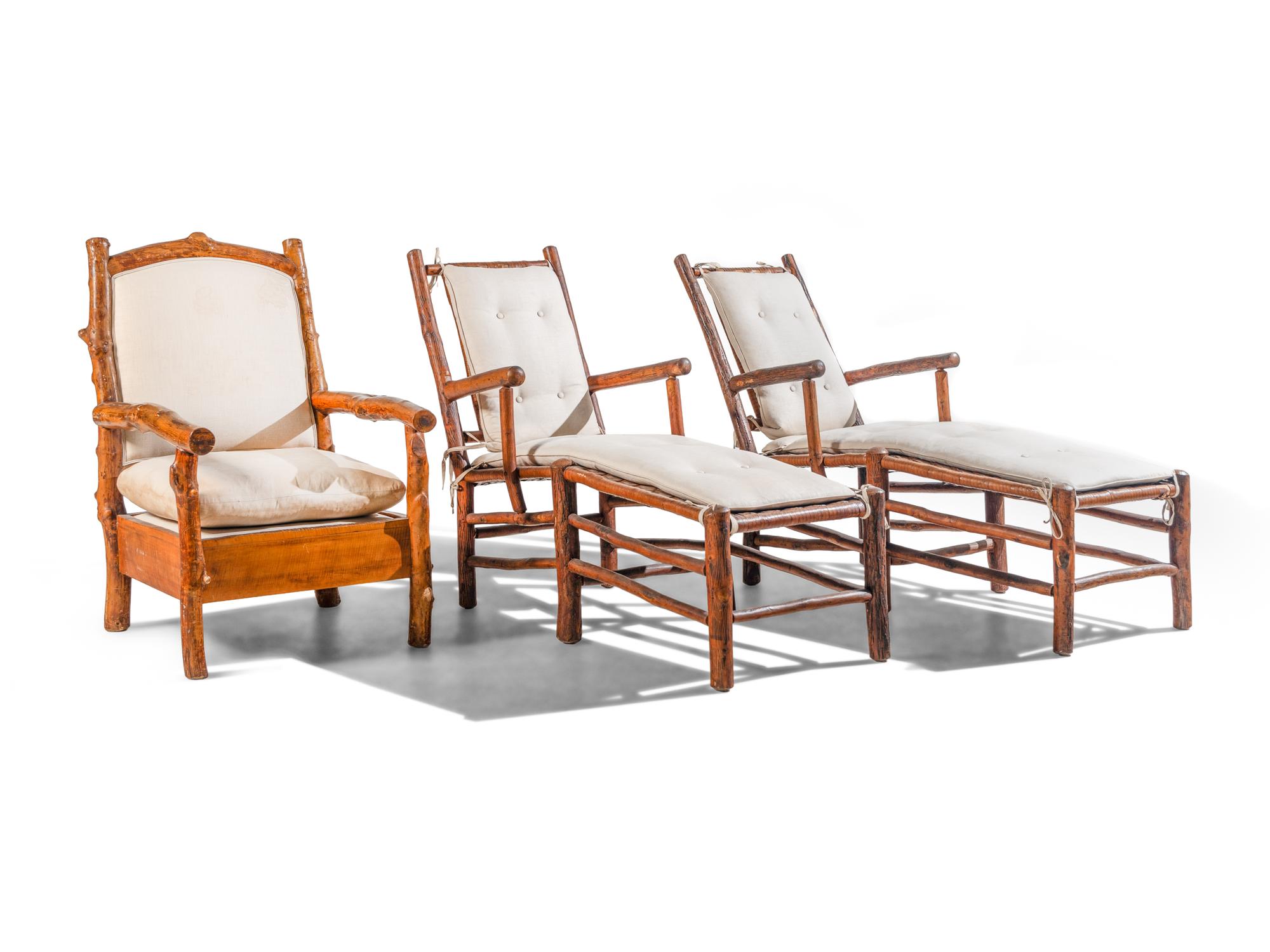 A Group of Three Rustic Wood Chairs
