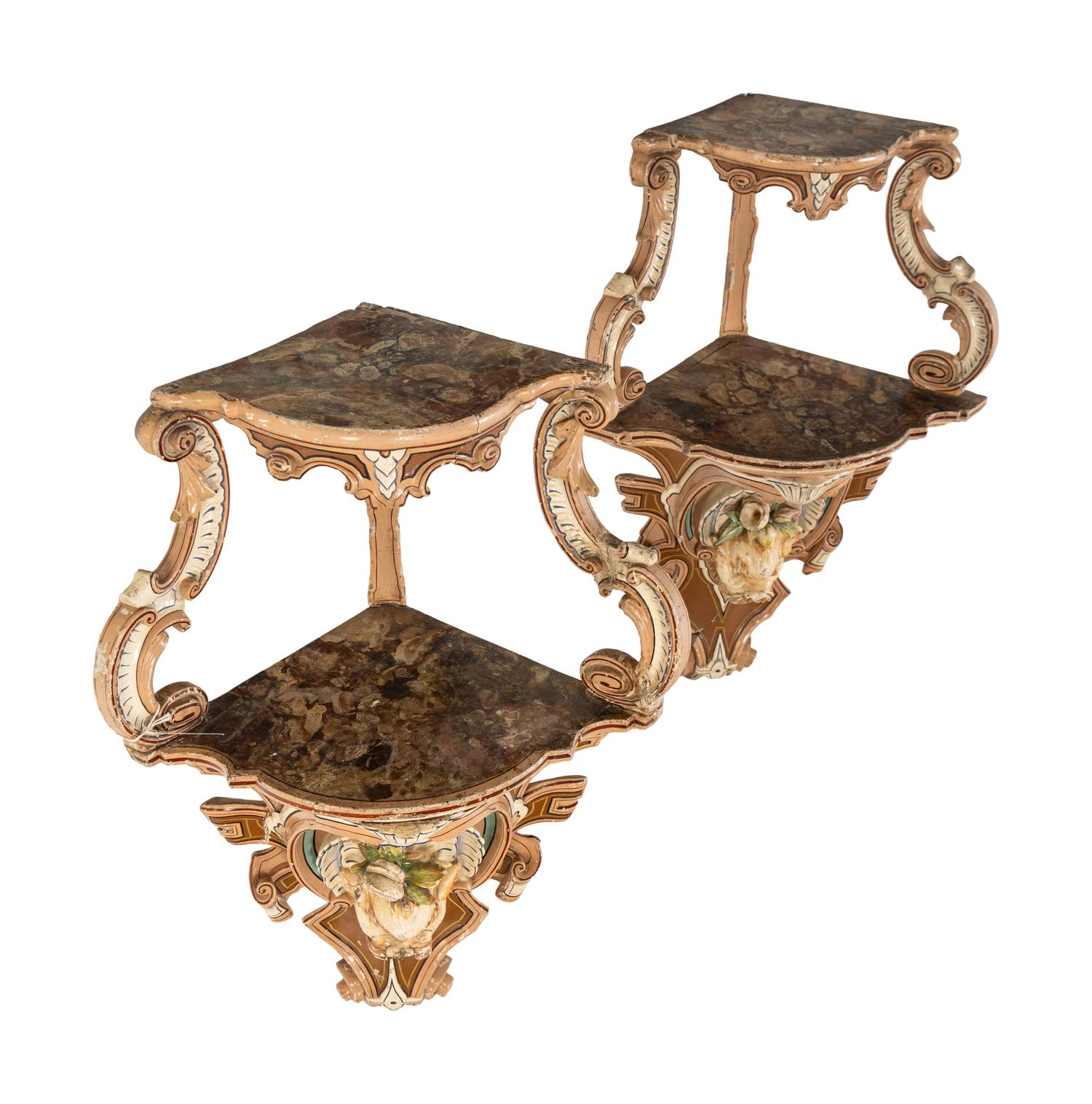 A Pair of Continental Carved and Painted Wood Wall Brackets