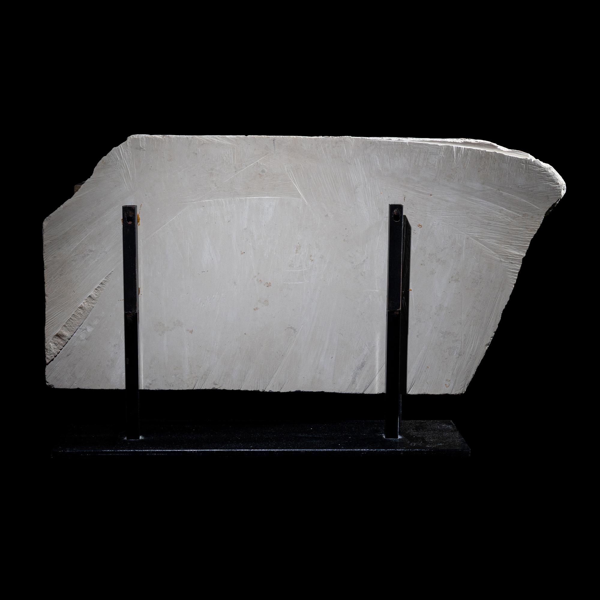 An Egyptian Polychrome Limestone Relief Fragment