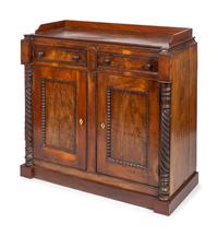 A British Colonial Padauk Side Cabinet — 20TH CENTURY
