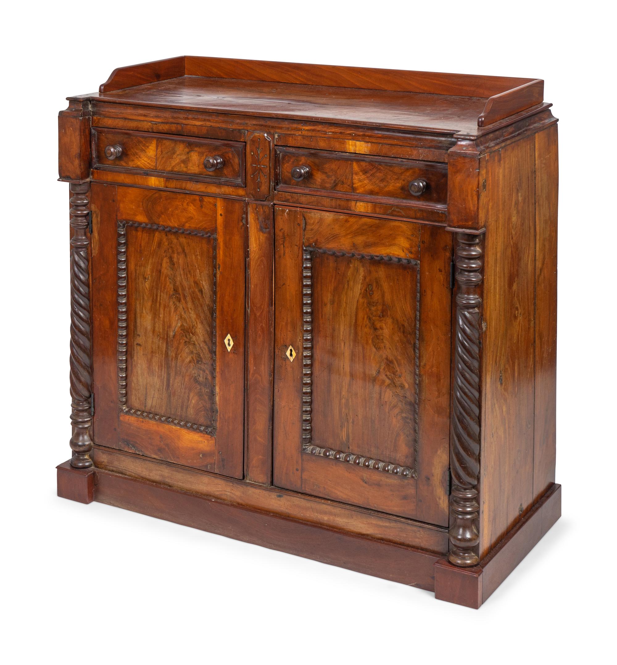 A British Colonial Padauk Side Cabinet — 20TH CENTURY