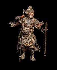 A Japanese Polychrome Painted Wood Figure of a Guardian