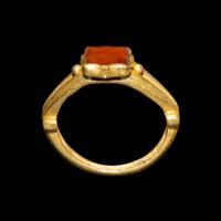 A Migration Period Gold and Spessartine Garnet Ring