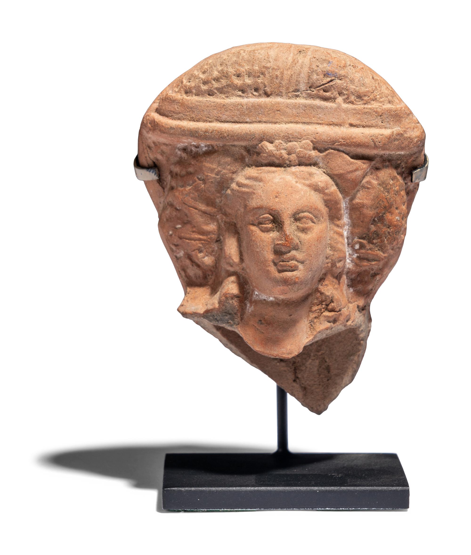 A Hellenistic Terracotta Head of a Goddess