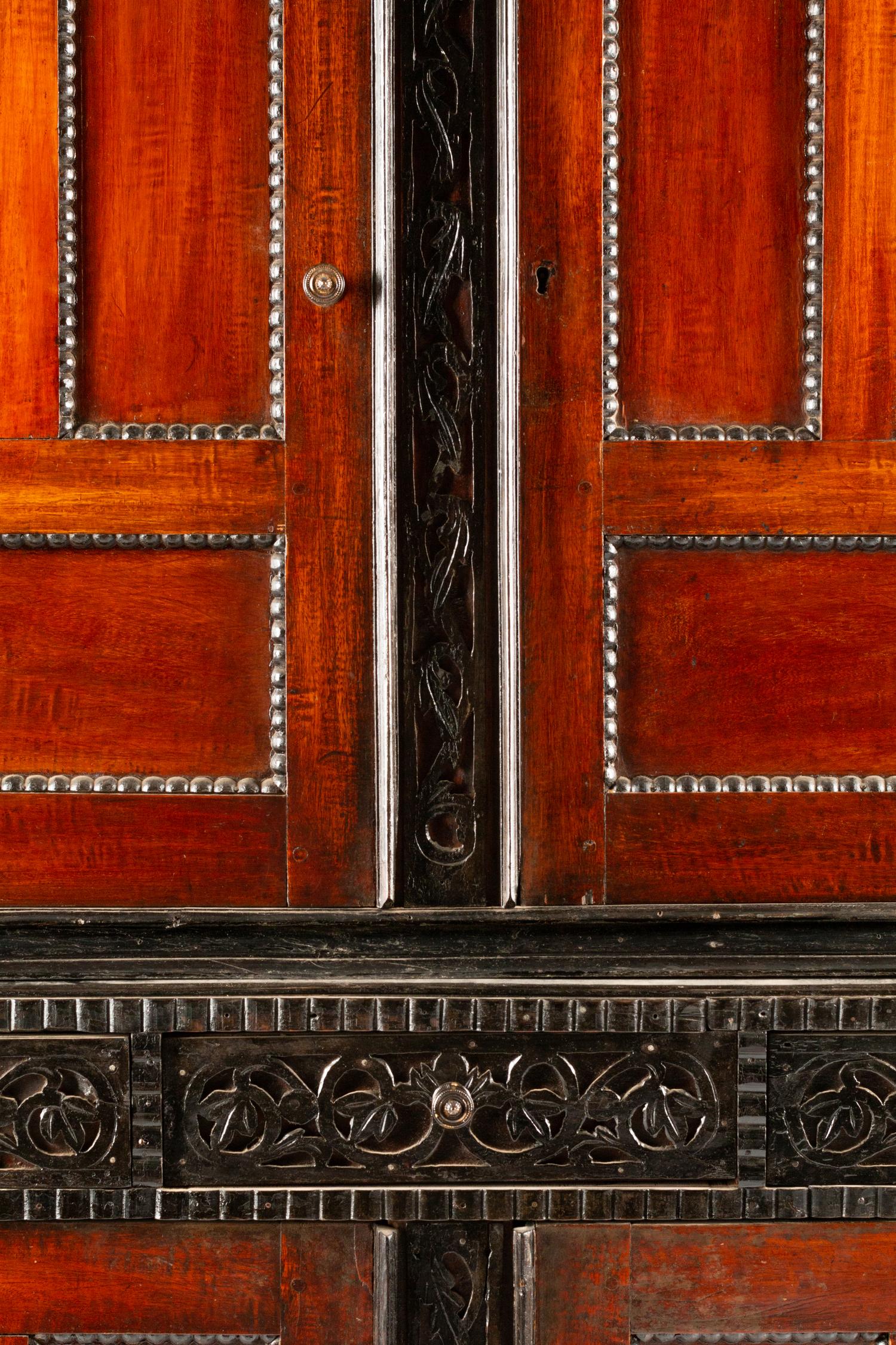 A Dutch Colonial Parcel Ebonized Mahogany Cabinet