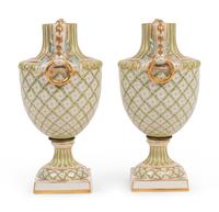 A Pair of Sèvres Style Porcelain Urns