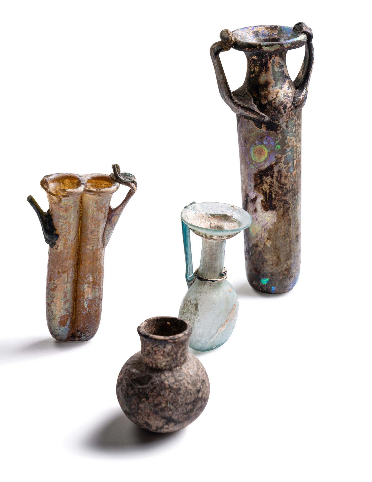 A Group of 9 Greco-Roman Glass Vessels