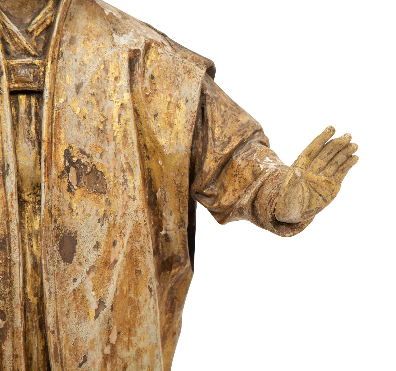 A Continental Carved Polychrome and Gilt Wood Figure
