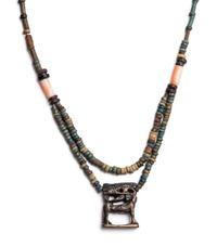 An Egyptian Bead and Faience Necklace with Silver Apis Amulet