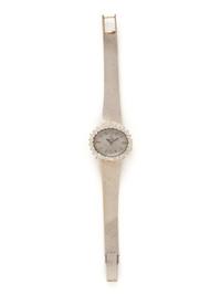 OMEGA, WHITE GOLD AND DIAMOND WATCH