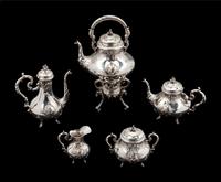 A French Silver and 18-Karat Gold Five-Piece Tea and Coffee Service