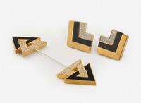 An 18K Yellow Gold, Diamond, and Onyx Jabot Pin and Matching Ear Clips