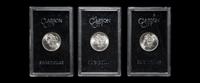 A Group of Three 1883-CC GSA: Morgan $1 Coins