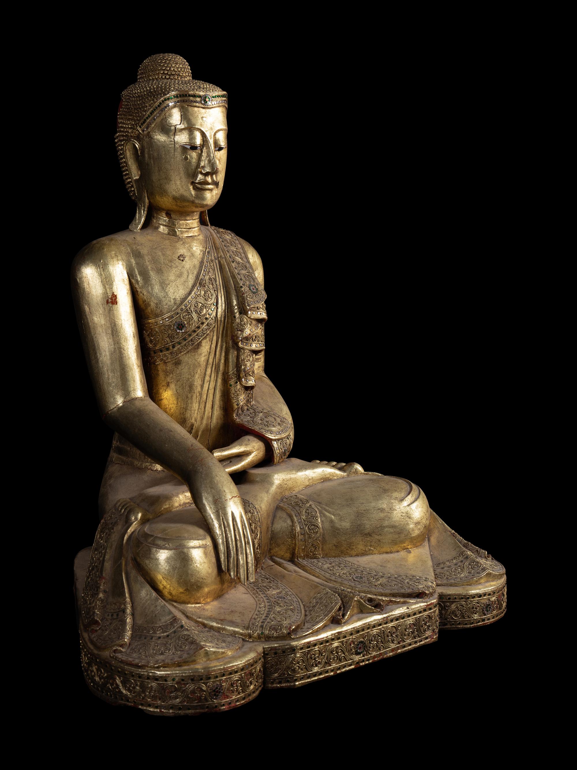 A Large Burmese Gilt Lacquered Figure of Buddha