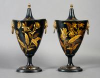 A Pair of Regency Tole Painted Chestnut Urns, Height 12 inches.