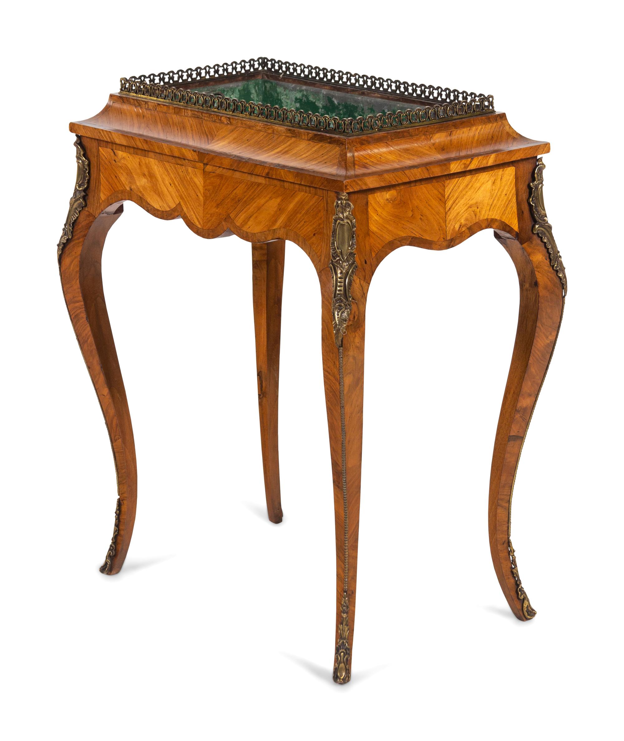 A Louis XV Style Gilt Bronze Mounted Kingwood Jardinière Stand