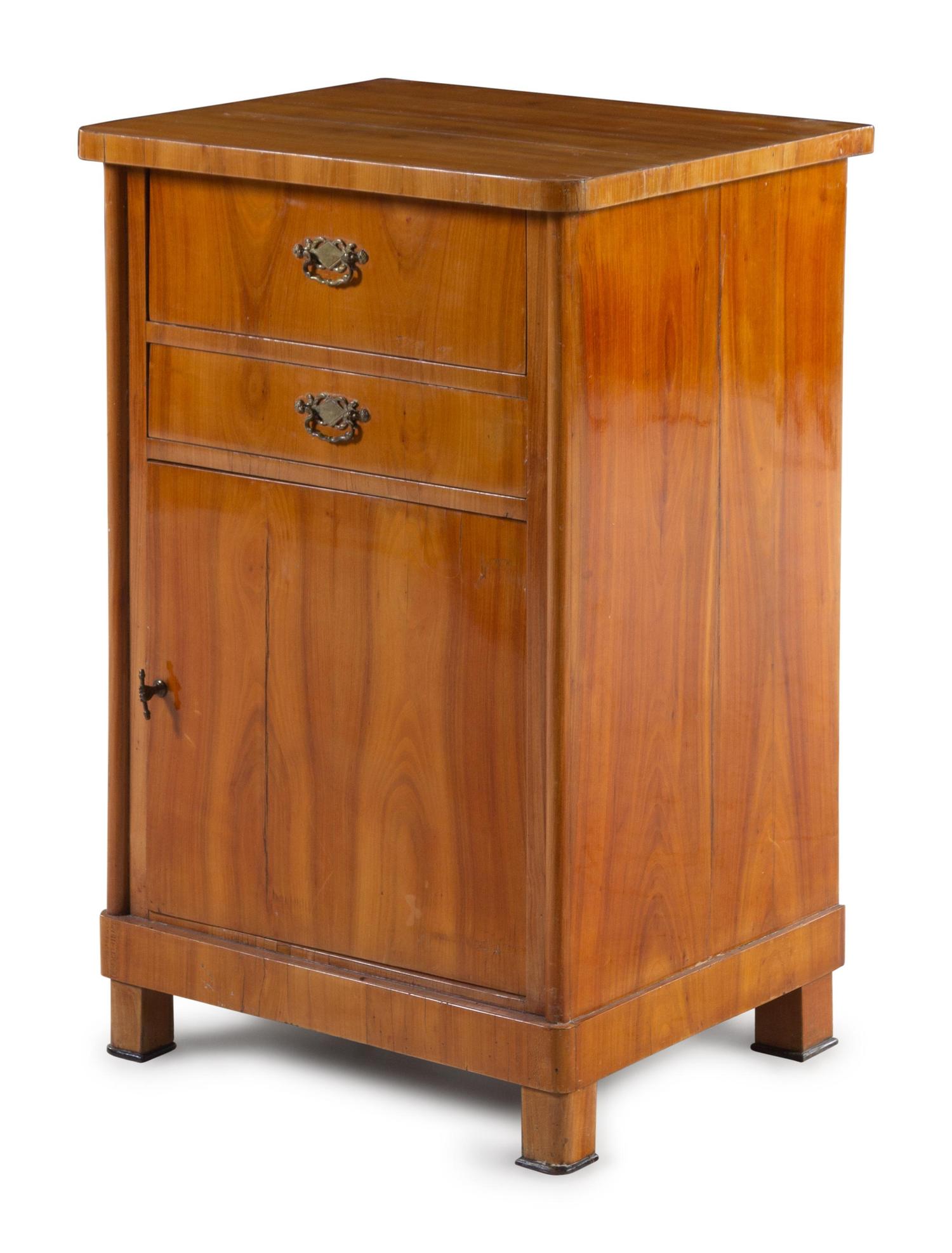 A Continental Walnut Cabinet