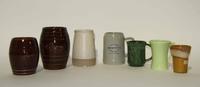 A Collection of Fifteen Haeger Pottery Mugs Height of tallest 6 inches.