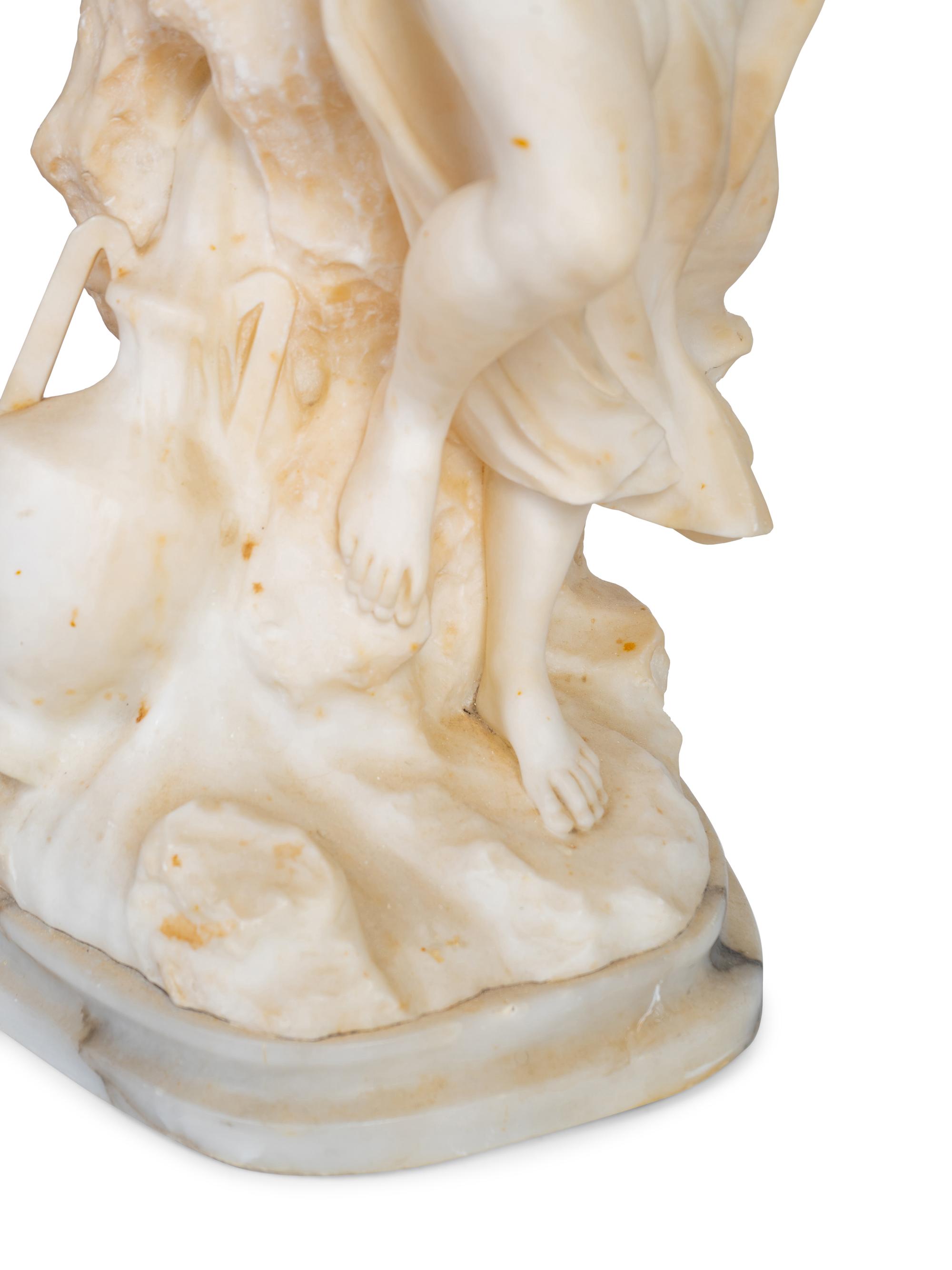 An Italian Carved Alabaster Figure of a Robed Maiden