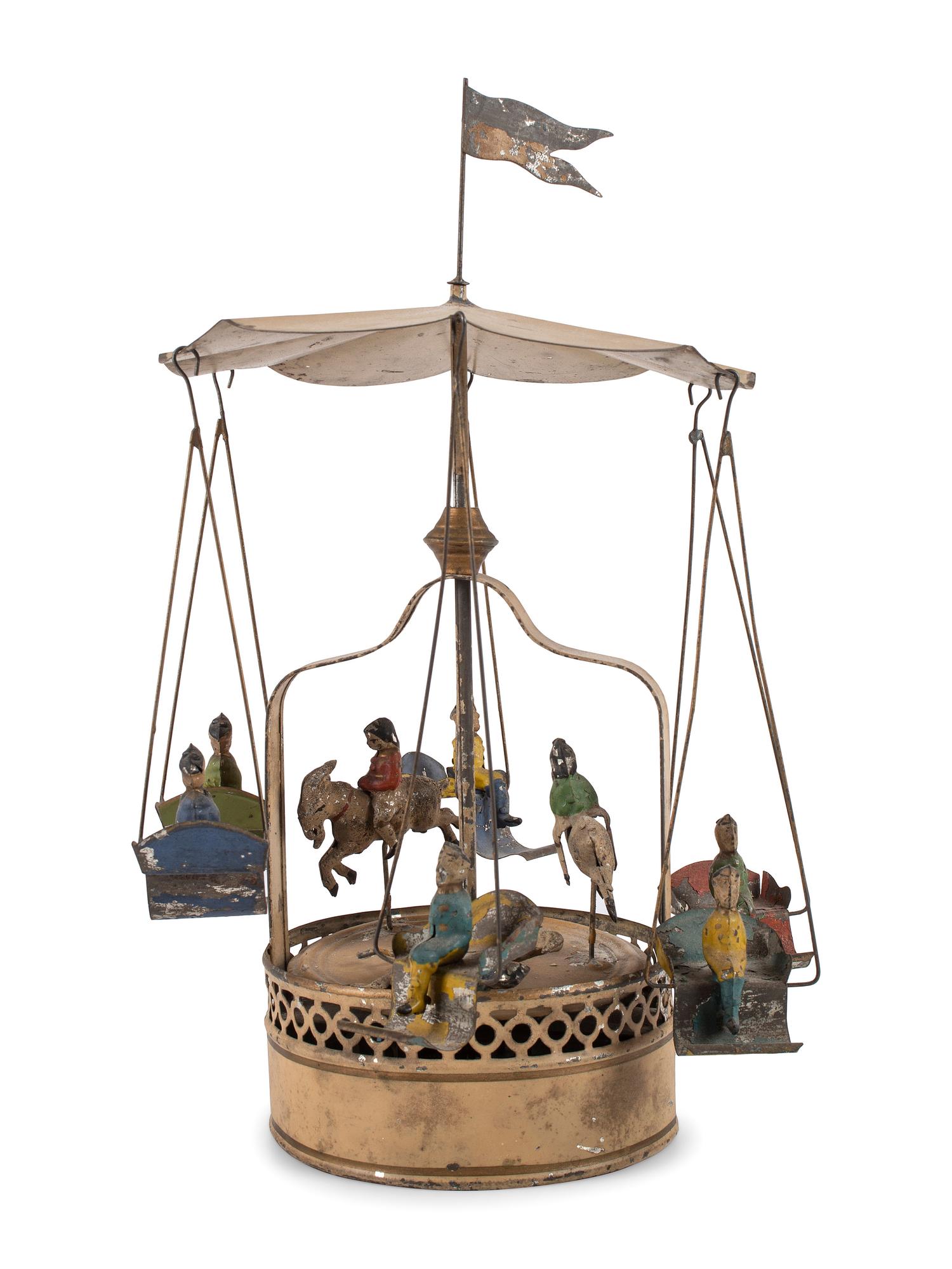A Group of Tin and Composite Toys