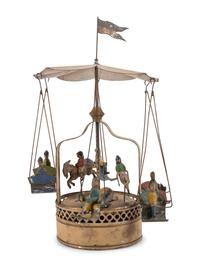 A Group of Tin and Composite Toys