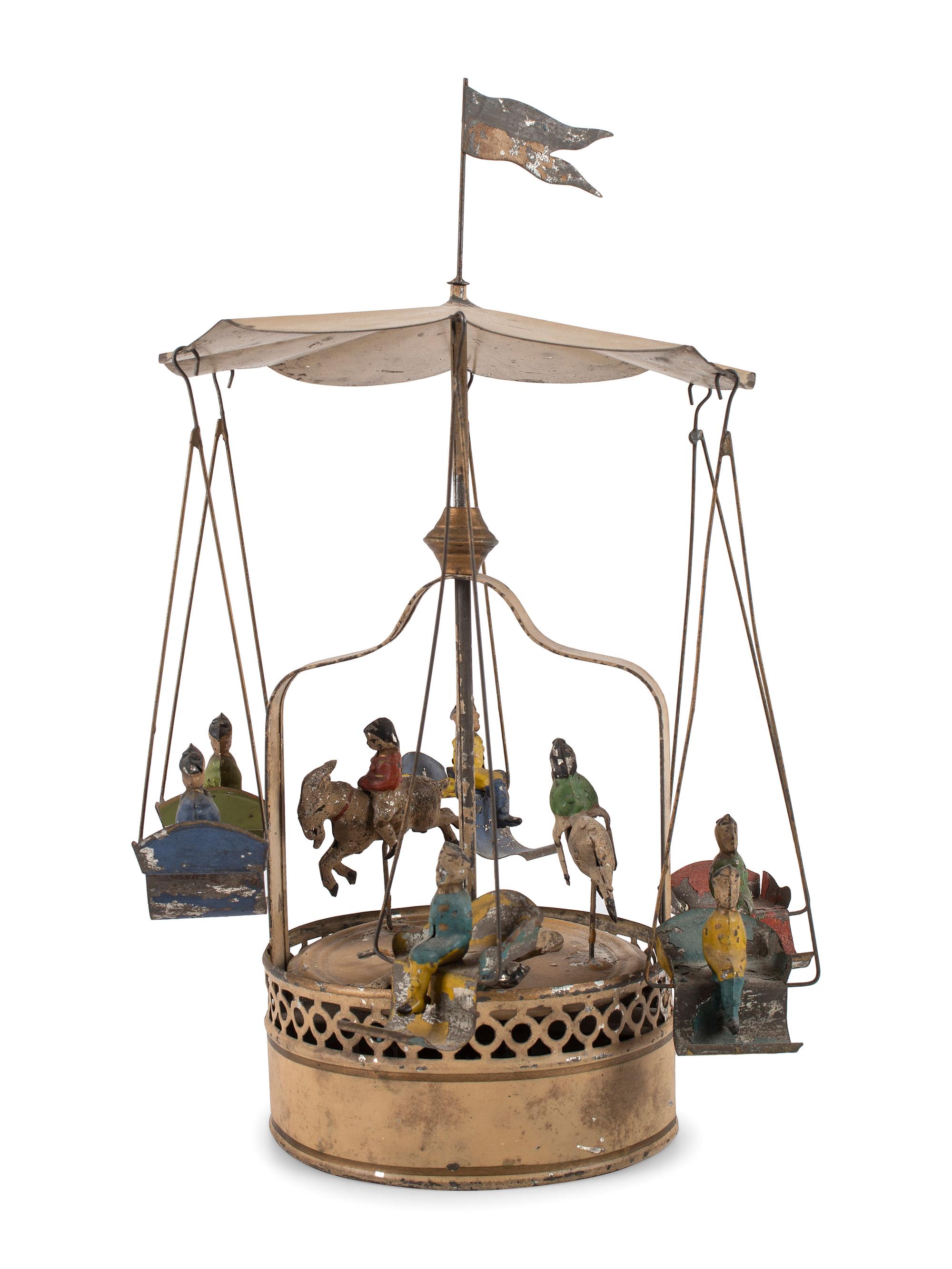 A Group of Tin and Composite Toys