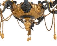 A French Neoclassical Gilt and Silvered Bronze Eighteen-Light Chandelier