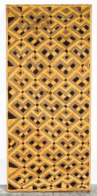 A Kuba Cloth Length 29 x width 12 3/4 inches.