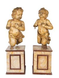 A Pair of Italian Carved and Parcel Gilt Cherubs — 19TH CENTURY
