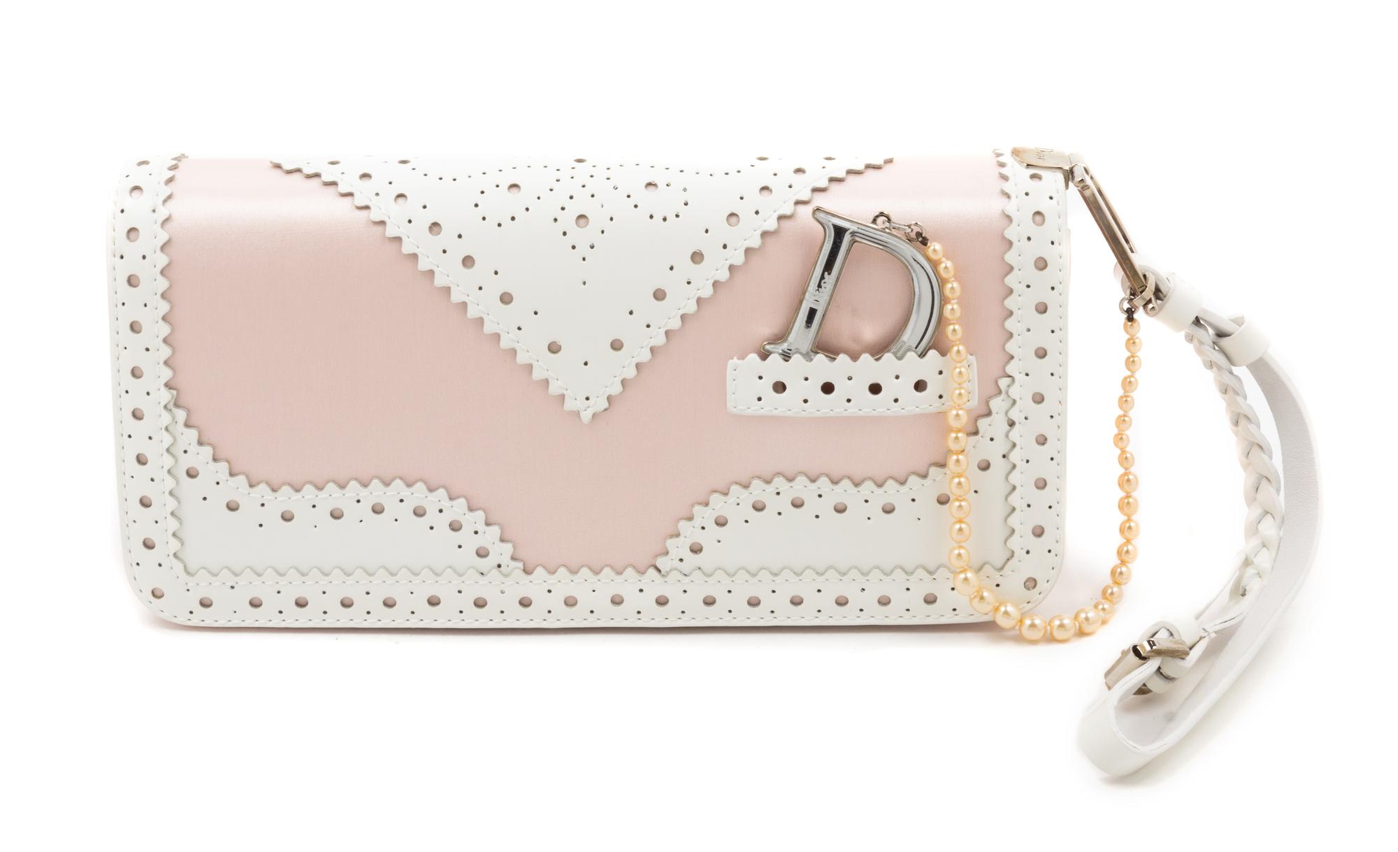 A Christian Dior Pink and White Wristlet Handbag, 8.5" x 4" x 2".
