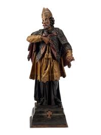 An Italian Carved and Painted Saint Figure and Stand
