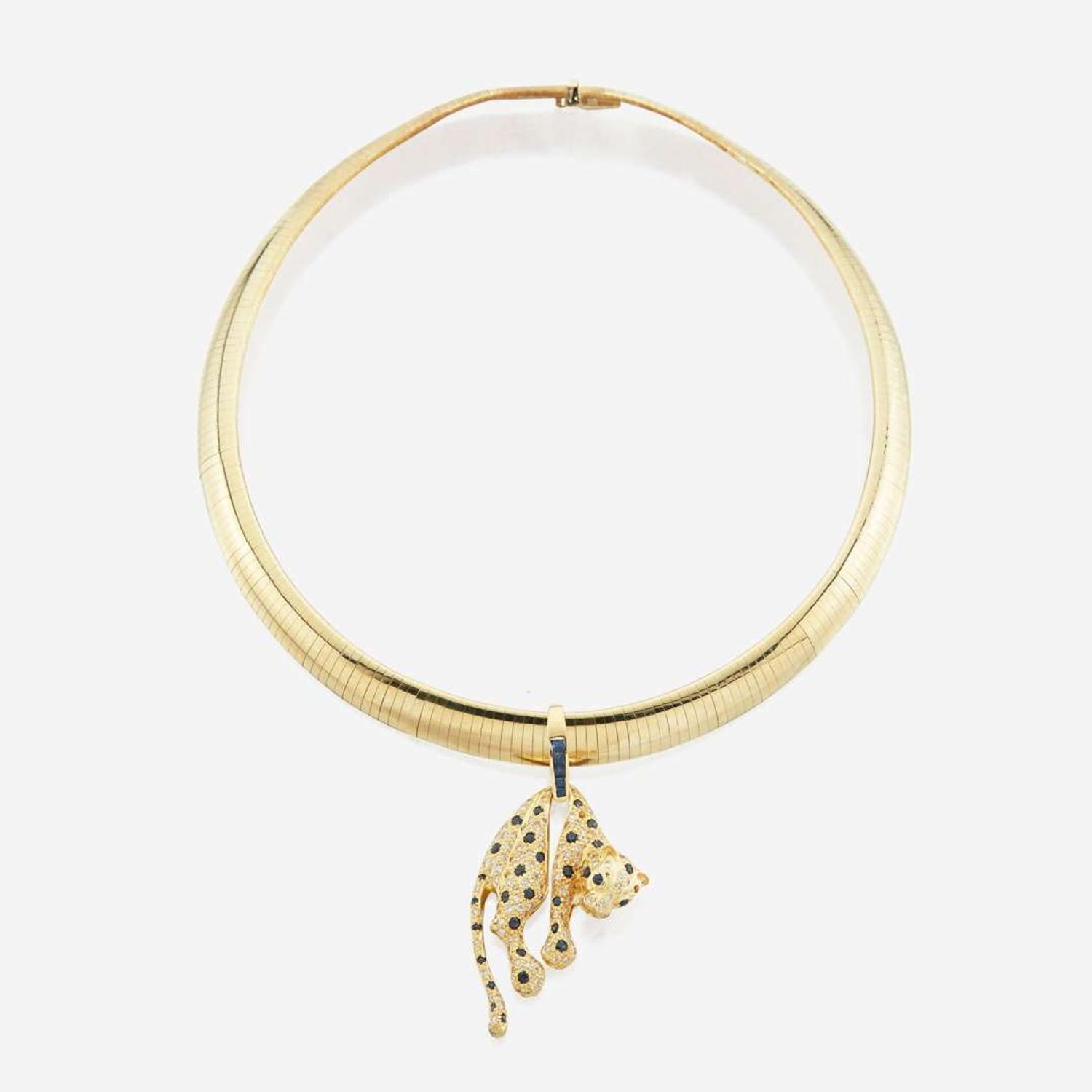 A diamond and sapphire gold necklace